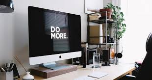 Modern web design workspace with iMac
